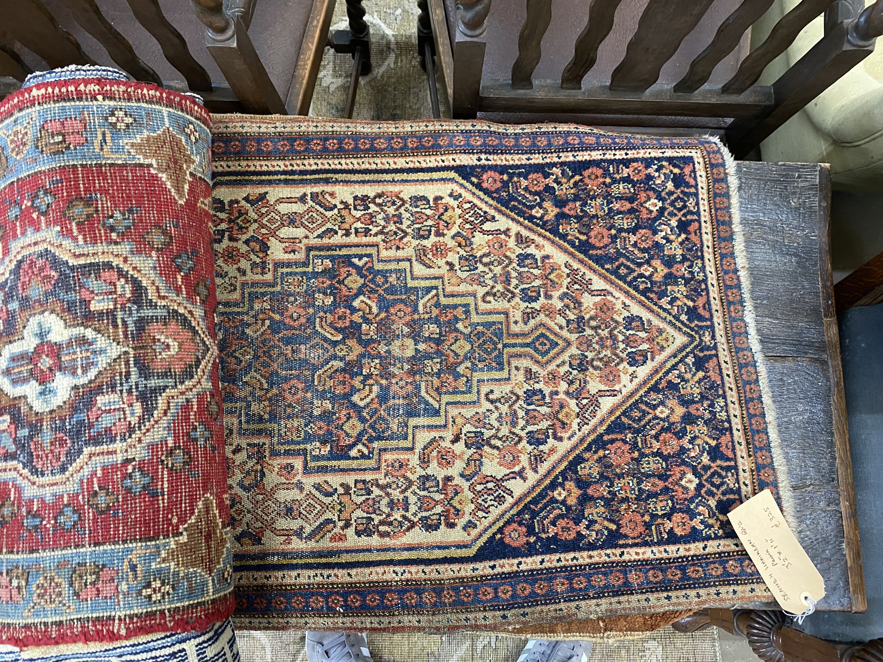 Nine Afghan, Persian and Chinese rug fragments.